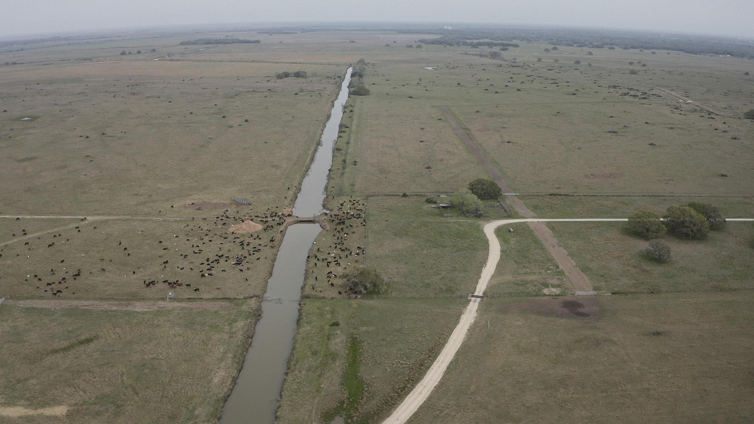 Photo over a river and a ranch